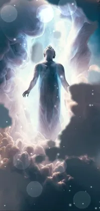 This stunning phone live wallpaper showcases a man standing amidst the clouds with a glowing, angelic form
