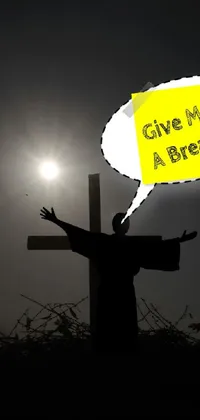 Looking for a stunning live wallpaper? Check out our latest creation featuring a person standing before a cross in front of a "give me a break" sign