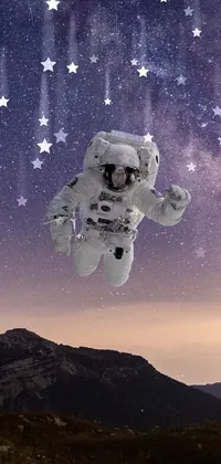 "Experience the vastness of space with this stunning live wallpaper featuring an astronaut floating effortlessly in front of a space tent