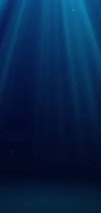 Immerse yourself in the serene depths of the ocean with this breathtaking phone live wallpaper