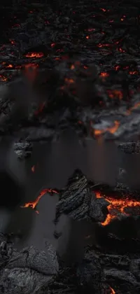 This dynamic phone live wallpaper depicts a lava field at night, set ablaze with red and orange magma