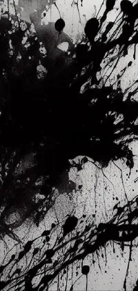 Looking for an edgy and unique phone wallpaper? Check out this black and white image of paint splattered on a wall