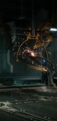 This phone live wallpaper is a sci-fi masterpiece featuring a highly detailed close-up of a robot auto-destructively creating something in a futuristic room