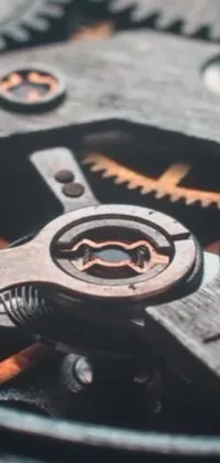 This stunning live wallpaper showcases the intricate mechanics of a watch, featuring close-up shots of the metal and wood gears