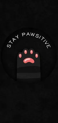 This live wallpaper for phones features a striking black t-shirt with bold, white typography conveying the message "Stay Pawstike"