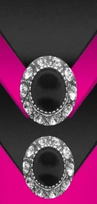If you're looking for a visually striking live wallpaper for your phone, check out this black and pink design