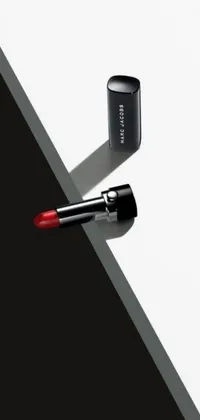 This live phone wallpaper showcases a red lipstick that exudes glamour and luxury