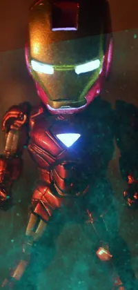 This phone live wallpaper features a toy Iron Man figurine styled as a hologram