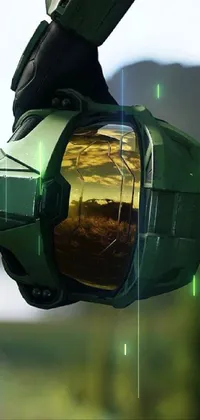 Looking for a striking live wallpaper for your phone? Check out this close up of a futuristic helmet with a glowing halo