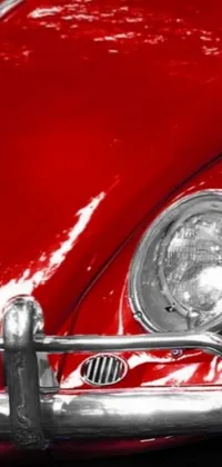 Get a unique and captivating live phone wallpaper that features a vintage VW beetle