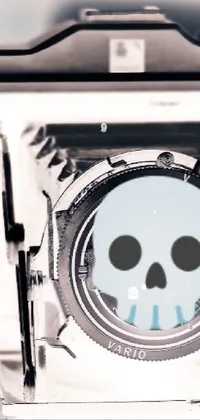 This phone live wallpaper features a close-up of a camera adorned with a skull