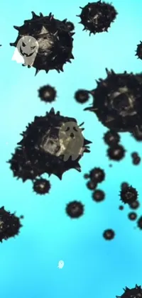 This phone live wallpaper features black balls floating amidst moving cogs and gears in the backdrop