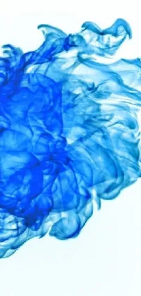 This stunning phone live wallpaper features a close-up of blue substance suspended in water