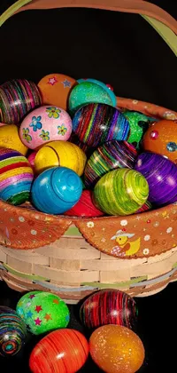 This lively Easter-inspired live wallpaper features a wooden basket overflowing with an array of colorful, beautifully decorated eggs