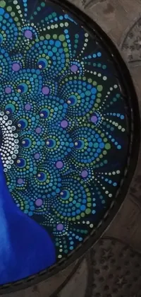 This vivid phone live wallpaper showcases an intricate painting of a peacock, utilizing the pointillism technique