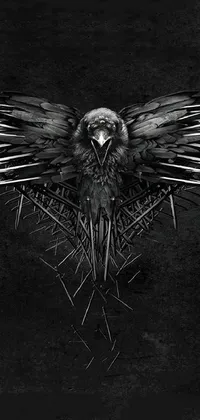 This live wallpaper features a captivating black and white photograph of a bird in flight, set against a gothic-inspired poster art