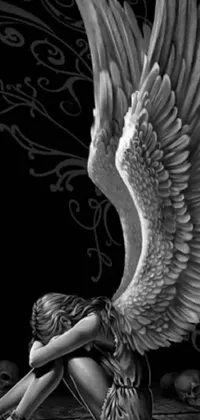 Get mesmerized by this stunning black and white phone live wallpaper showcasing a highly detailed close-up of a serene angel sitting on the ground