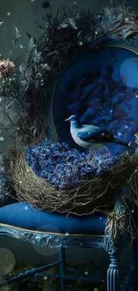 Discover a captivating mobile live wallpaper featuring a majestic bird sitting on a blue chair surrounded by a beautiful crown of blue flowers