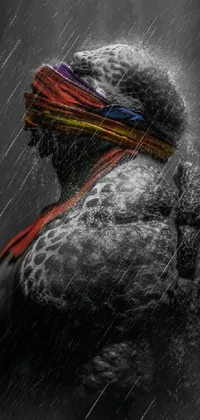 This live wallpaper captures a striking artistic moment in black and white, depicting a warrior standing in the rain