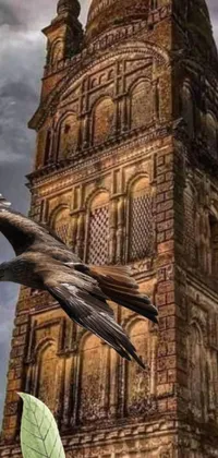 This stunning gothic art live wallpaper features an elegant bird hunting for prey in front of an old tower