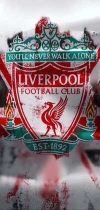 Bring your phone to life with this Liverpool phone live wallpaper! Featuring a bold red and white flag with the iconic word "Liverpool" emblazoned in the center, it's the perfect digital art to show off your appreciation for the legendary football club