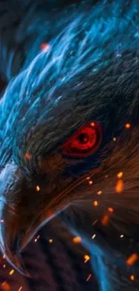 This phone live wallpaper showcases a stunning digital artwork of a bird of prey with red eyes and blue fire powers