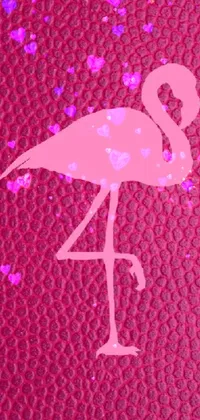 This phone live wallpaper features a pink flamingo on a textured pink leather background