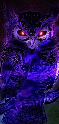 The purple owl live wallpaper depicts a fascinating creature with red eyes and a mixture of owl and wolf traits perched on a tree branch
