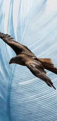 Looking for a dynamic and eye-catching live wallpaper for your phone? Look no further than this stunning image of a bird in flight