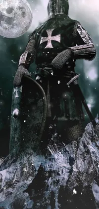 This phone live wallpaper showcases a knight from the Holy Roman Empire standing on a dark mountain top