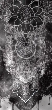 This phone live wallpaper features a black and white drawing of a flower surrounded by intricate psychedelic art, floating in space alongside an intricate machine