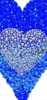 This live wallpaper for your phone showcases a stunning blue heart on a white background, featuring crystal cubism and sparkling gems