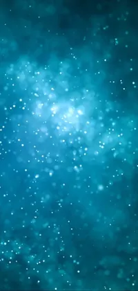 Decorate your phone with an incredible live wallpaper featuring a stunning blue background with snowflakes and stars