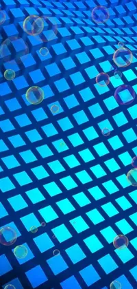 This live wallpaper for your phone features a delightful visual of bubbles floating on a blue surface
