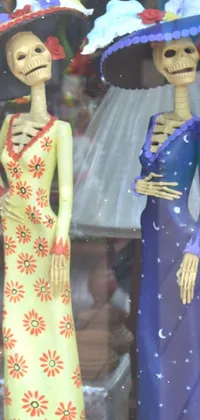 This live wallpaper depicts a day of the dead-themed shop window with colorful figurines arranged in cloisonné technique against a black background