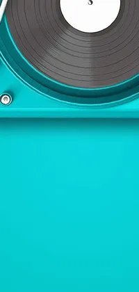 Bring style and personality to your phone with this fun and vibrant live wallpaper! Featuring a retro record player and turntable with a pop art design, the textured turquoise background adds depth and dimension