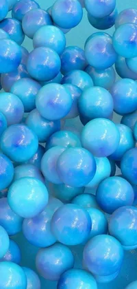 This stunning live wallpaper features a bunch of iridescent blue eggs resting on a table, occasionally wiggling or cracking open to reveal a cute creature