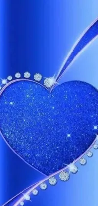 Add a splash of glitter to your phone screen with this beautiful blue heart live wallpaper! Sporting a digital art design, this heart-shaped crystal creates a magical effect, while the water droplets add realism