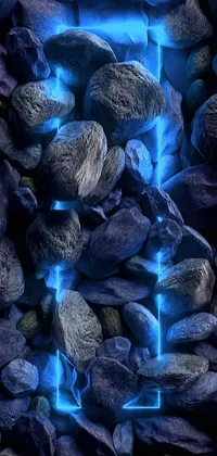 This stunning live wallpaper depicts a blue light emanating from a pile of rocks, surrounded by energy flows of water and fire