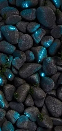 This phone live wallpaper features a stunningly realistic painting of rocks, with glowing veins of white and teal electricity and blue fireflies dancing across the surface