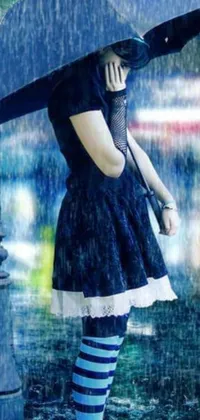 This gothic-themed live phone wallpaper features an artistic image of a woman in a blue dress and knee-high socks standing under an umbrella in the rain