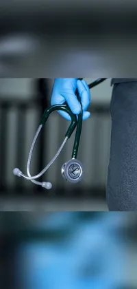 This live wallpaper features a realistic photo of a person wearing gloves and a lab coat, and holding a stethoscope against their chest