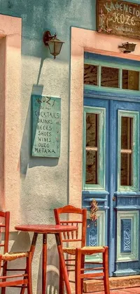This live phone wallpaper features an art nouveau-style building with two wooden chairs outside