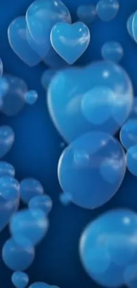 This fluid simulation live wallpaper features a plethora of blue balloons rising up against a gradient background of blue and pink hues
