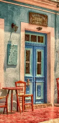 This live wallpaper features a vivid photograph of two wooden chairs situated outside a busy Greek restaurant