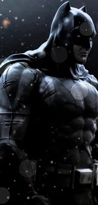 This awe-inspiring phone wallpaper portrays an up-close shot of the legendary Batman, clad in his iconic suit, with intricate details of the costume visible, like the well known bat logo and the textured suit