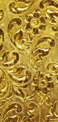 This phone live wallpaper features a stunning gold fabric with intricate baroque designs, creating an opulent atmosphere