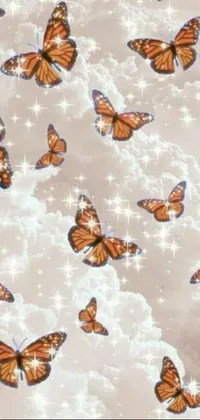 This phone live wallpaper depicts an enchanting digital art scene of colorful butterflies gracefully flying through the heavenly white clouds
