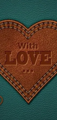 This phone wallpaper features a darling leather heart with the word "love" inscribed on it against a trending Pixabay album cover