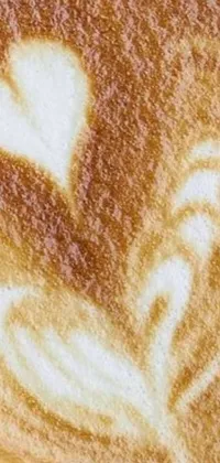 This coffee-themed phone live wallpaper features a closeup image of a steamy cup of latte art coffee and slice of toast
